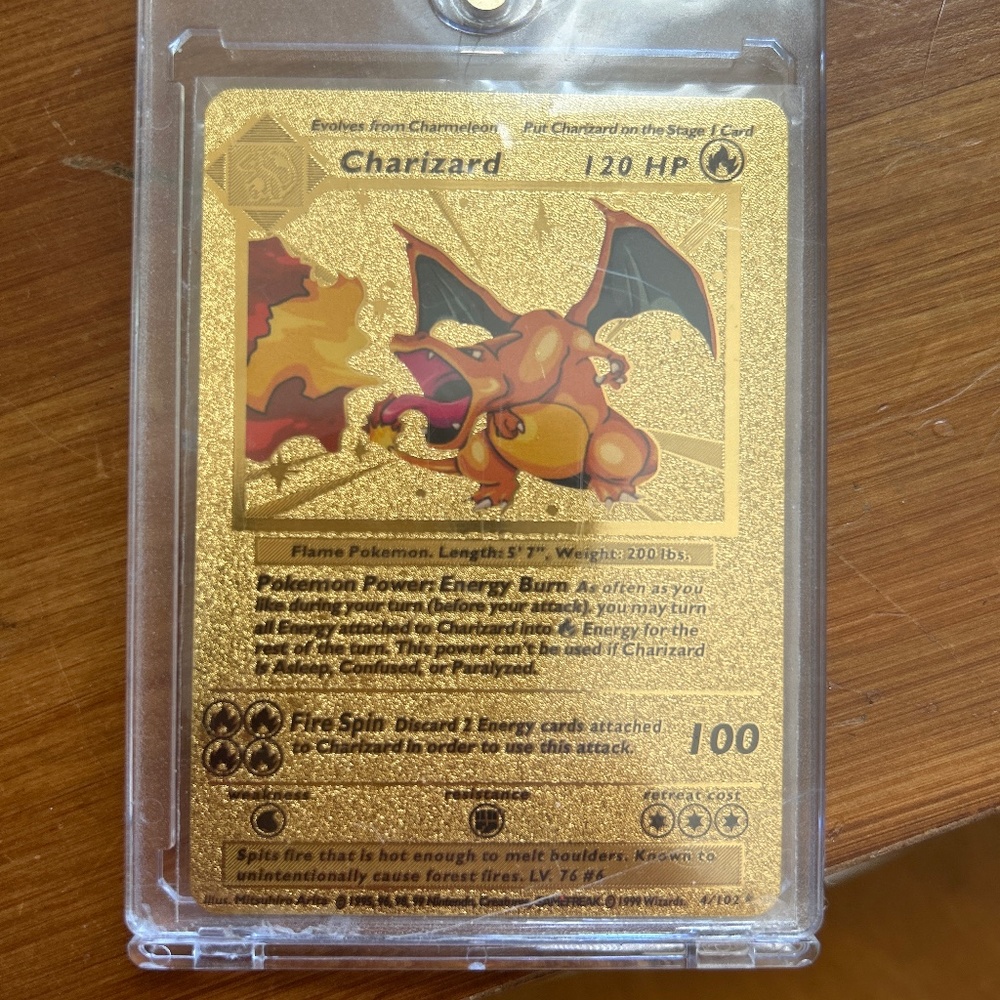 Gold foiled Charizard 1st edition